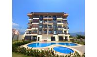 AL-1641, Bright and Spacious Garden-Floor Apartment in a Residential Complex with Pool