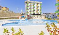 AL-1880, New Unfurnished 1+1 Apartment (55 m²) on the 3rd Floor with Balcony, Large Pool with Aqua Park, Sauna and Gym – Avsallar