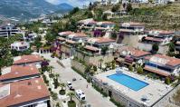 AL-2131, Own Garden and Sea Views – Furnished 100 m² 2+1 Ground-Floor Apartment with Pool, Sauna and Gym, Kargıcak