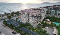 AL-2141, Beachfront Living with a Large Sea-View Balcony – Luxury Furnished 70 m² 1+1, Two Pools and Sauna, Kestel