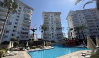 AL-2161, Covered Pool, Tennis Court and Gym – Spacious 130 m² 2+1 with Wraparound Balcony in Cikcilli