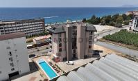 AL-2212, 50 m to the Sea – Top-Floor Duplex 100 m² 2+1 with Sea-View Balconies, Pool, Sauna and Steam Room, Kargicak