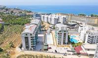 AL-2214, Ground-Floor Garden Duplex – New 100 m² 2+1 with Terrace and Pool Access, Hamam and Water Slides, Kargicak